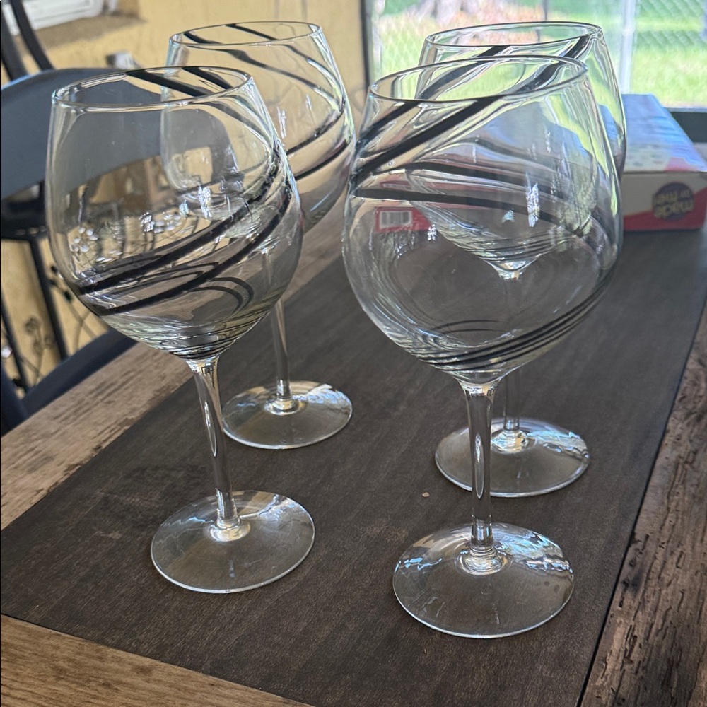 Elegant Wine Glasses with Black Swirl Design